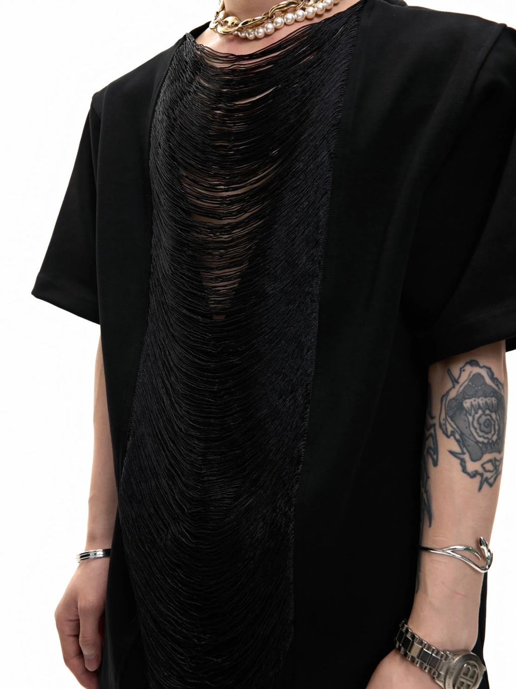 Men's loose black V-neck short sleeve t-shirt with three-dimensional cutting on a neutral background
