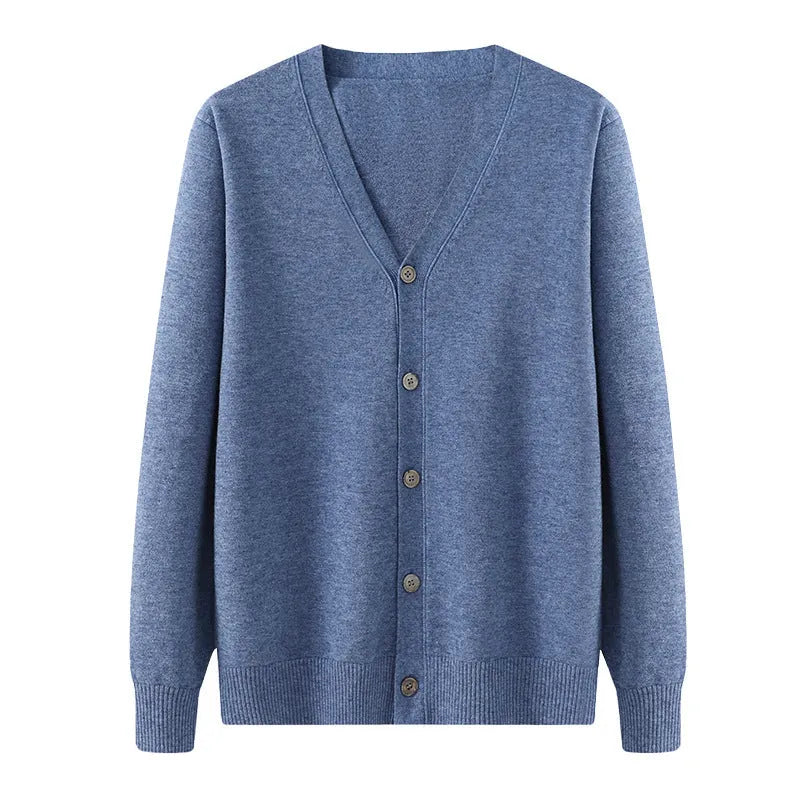 Man wearing a loose V-neck cardigan coat in Andy Velvet fabric, showing the long sleeves and available colour options.