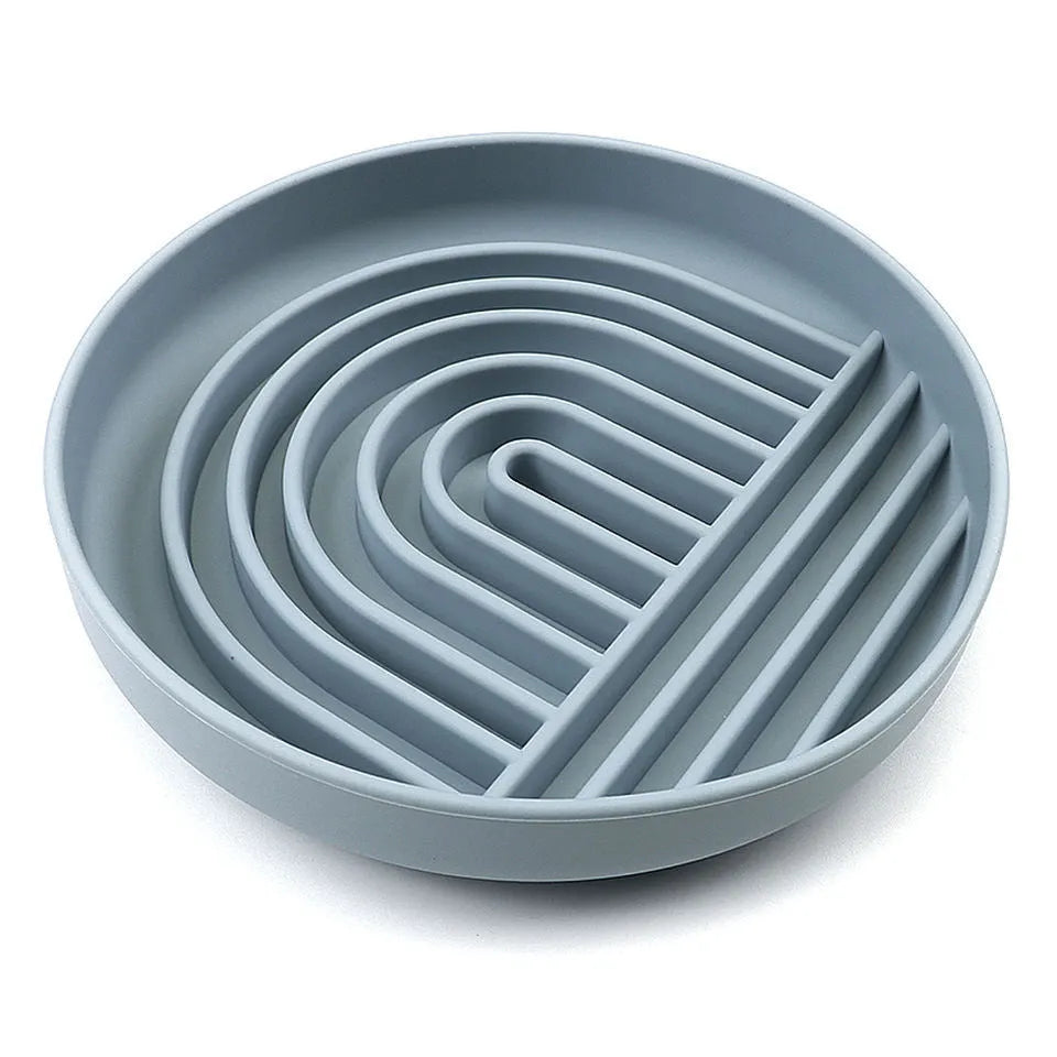 Silicone slow feeder dog bowl with ridges, shown in mustard green colour