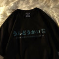 A loose-fit black cotton short sleeve t-shirt laid flat, showing its pullover style and regular sleeves.