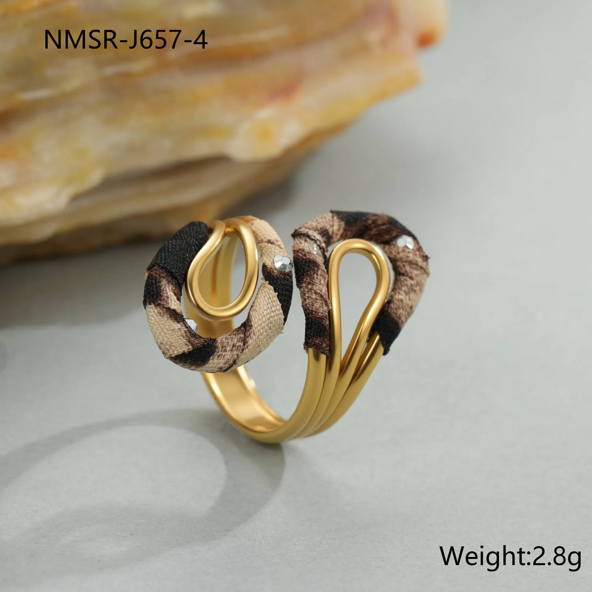 Geometric stainless steel open mouth ring with leopard print patterns in heart and star shapes