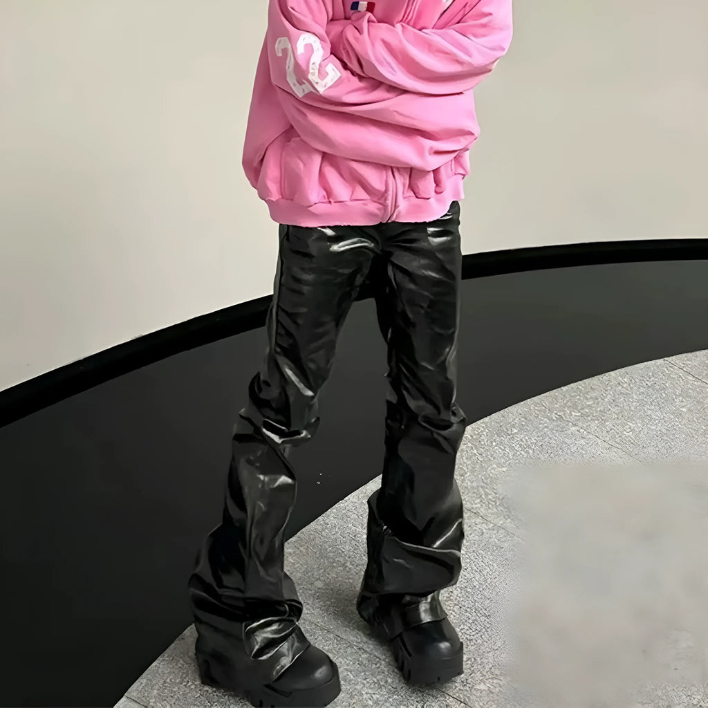 Black shiny patent leather skinny jeans with straight-leg cut and mid-rise waist