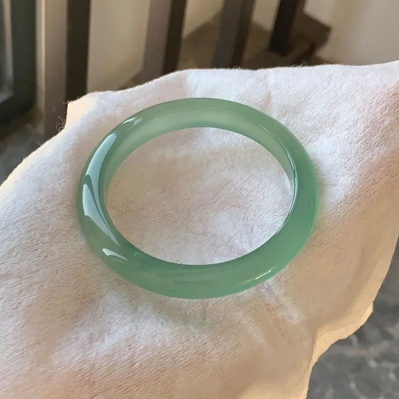 Natural agate wide tyre bracelet in 10mm width showing pink stone variant with size marking