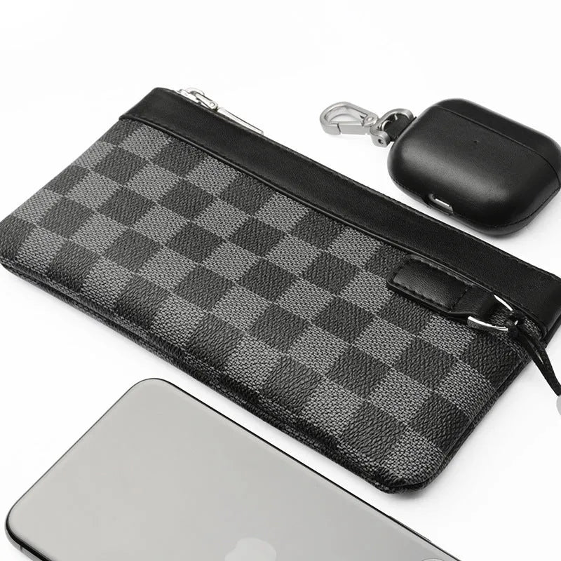 Black leather plaid clutch wallet showing first layer cowhide texture and polyester lining