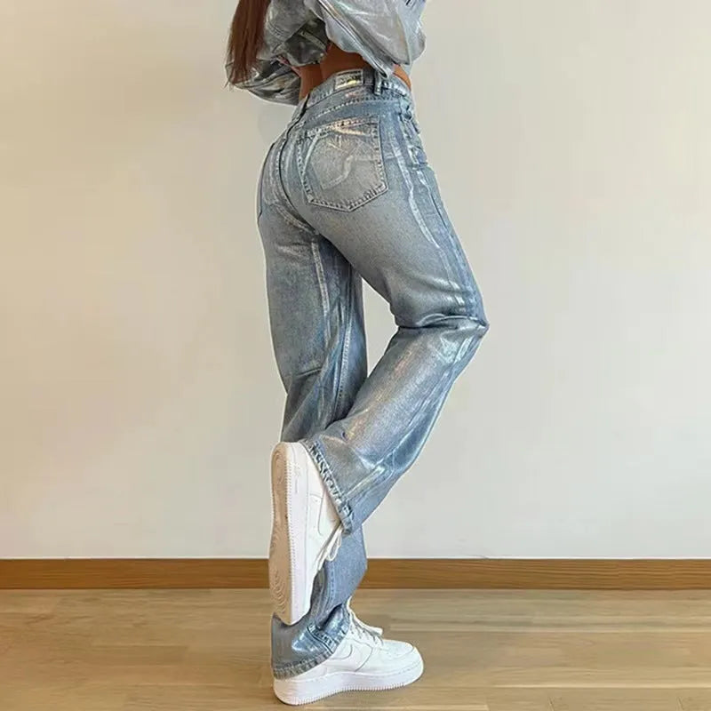 Women's washed blue high waist straight leg denim jeans with street hipster styling and contrast colour details