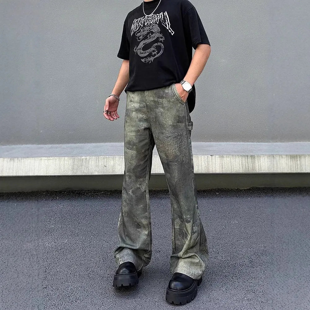 Man wearing retro digital camouflage print straight-leg jeans in cotton denim.