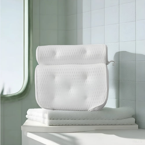 White bathtub pillow with 7 suction cups on a breathable 3d mesh material.