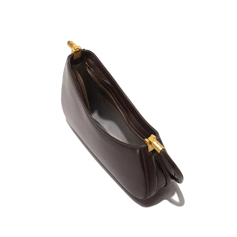 Women's oval retro underarm bag in PU leather with single strap and sewing line detailing