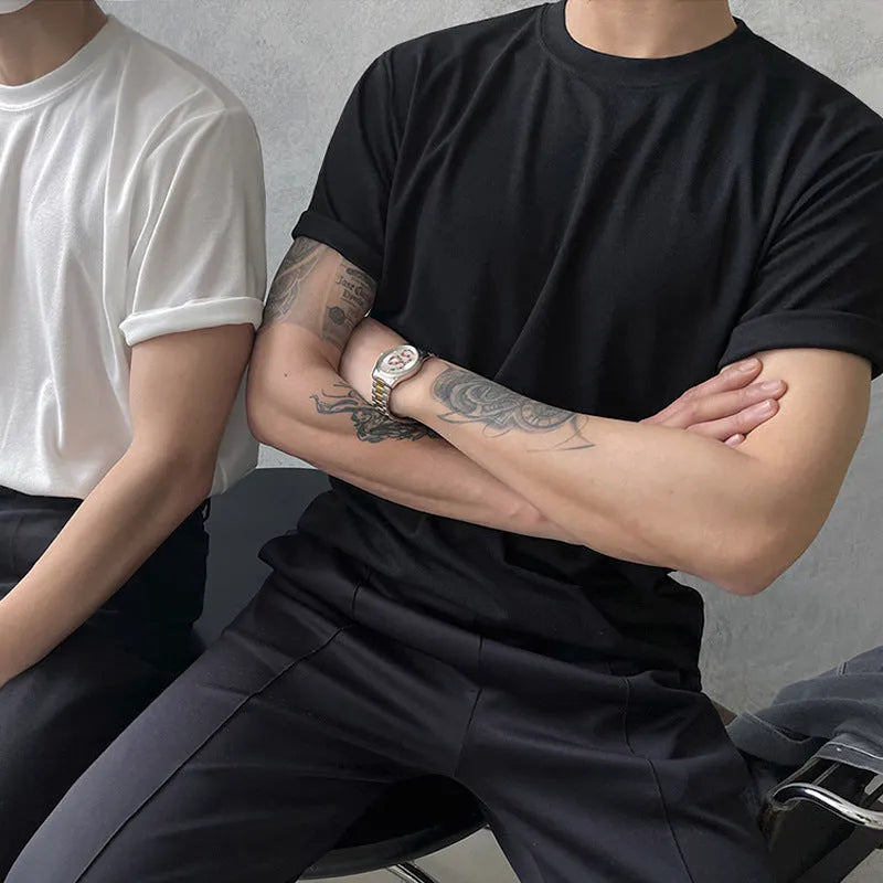 Men's slim fit cotton T-shirt in black or white with round neck and half sleeves