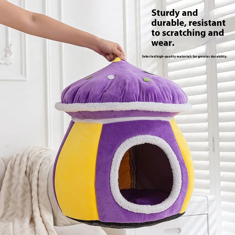 Purple mushroom-shaped plush cat bed for small pets on a grey background.