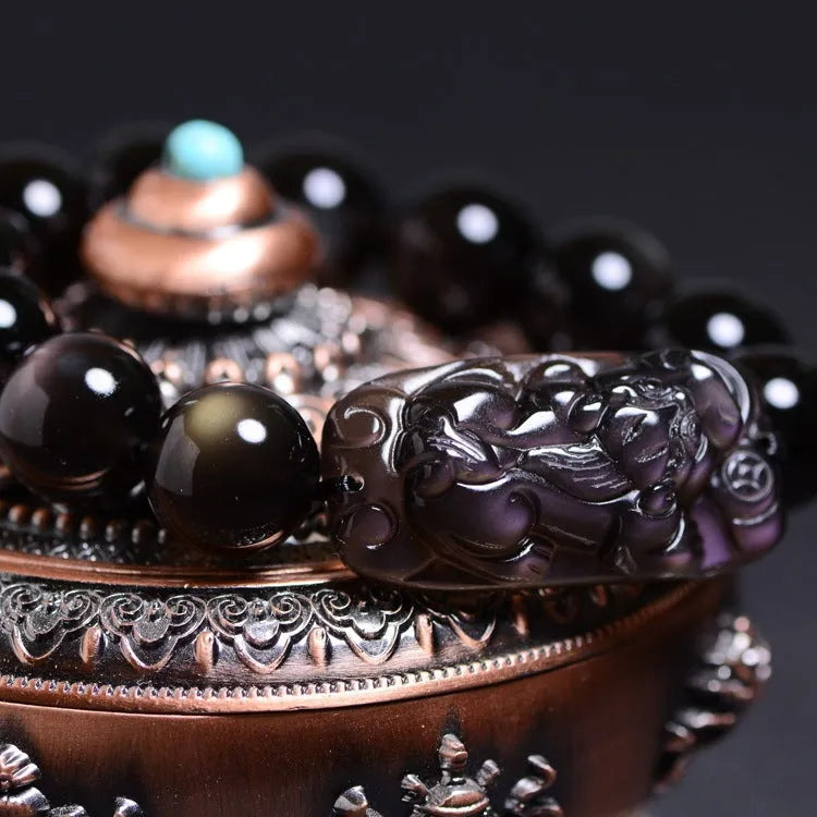 Natural crystal Pi Xiu bracelet with icy obsidian beads in geometric ethnic design