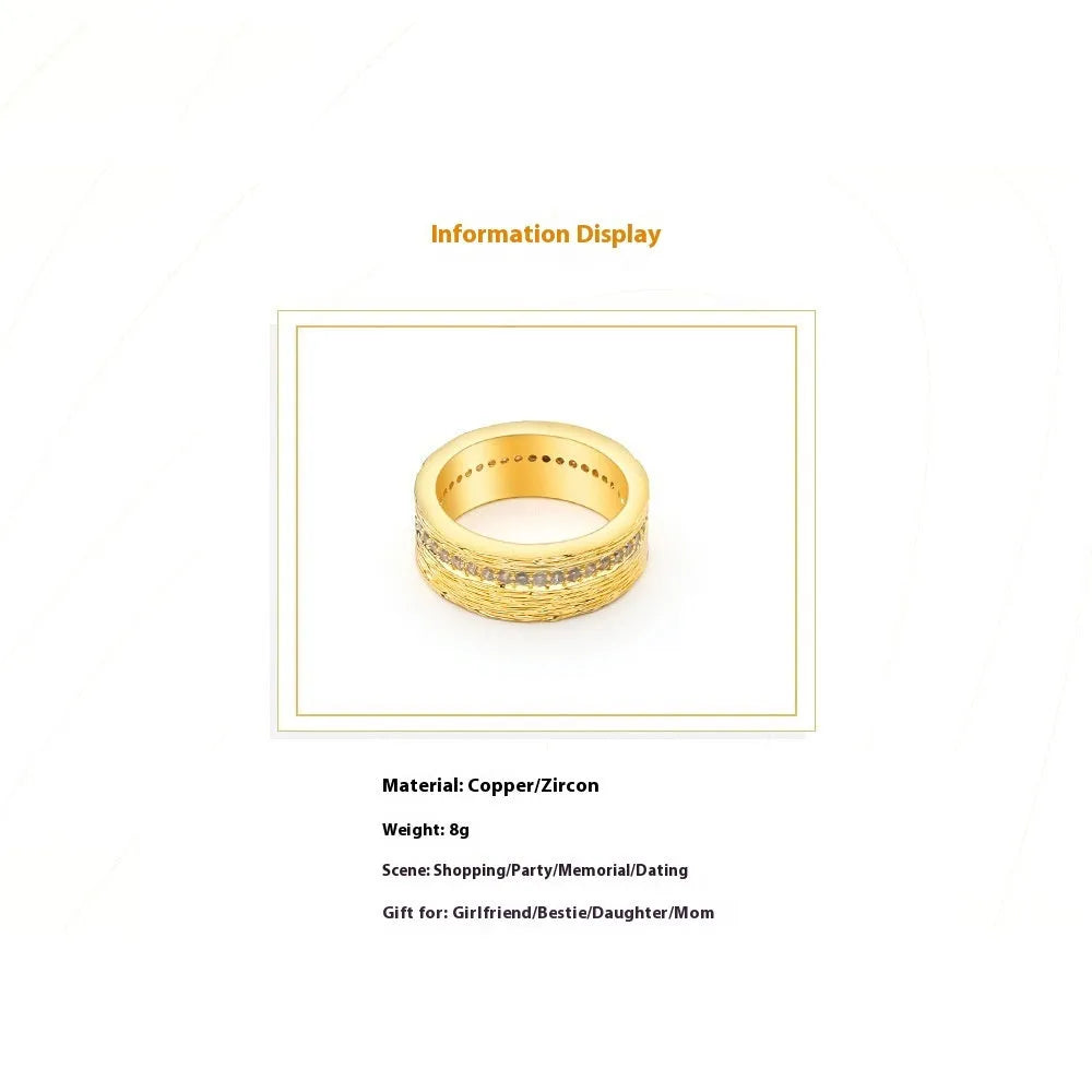 Gold geometric zircon ring with angular design on copper construction
