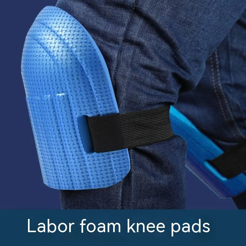 A pair of thick EVA foam kneepads in blue, shown on a hard floor surface.