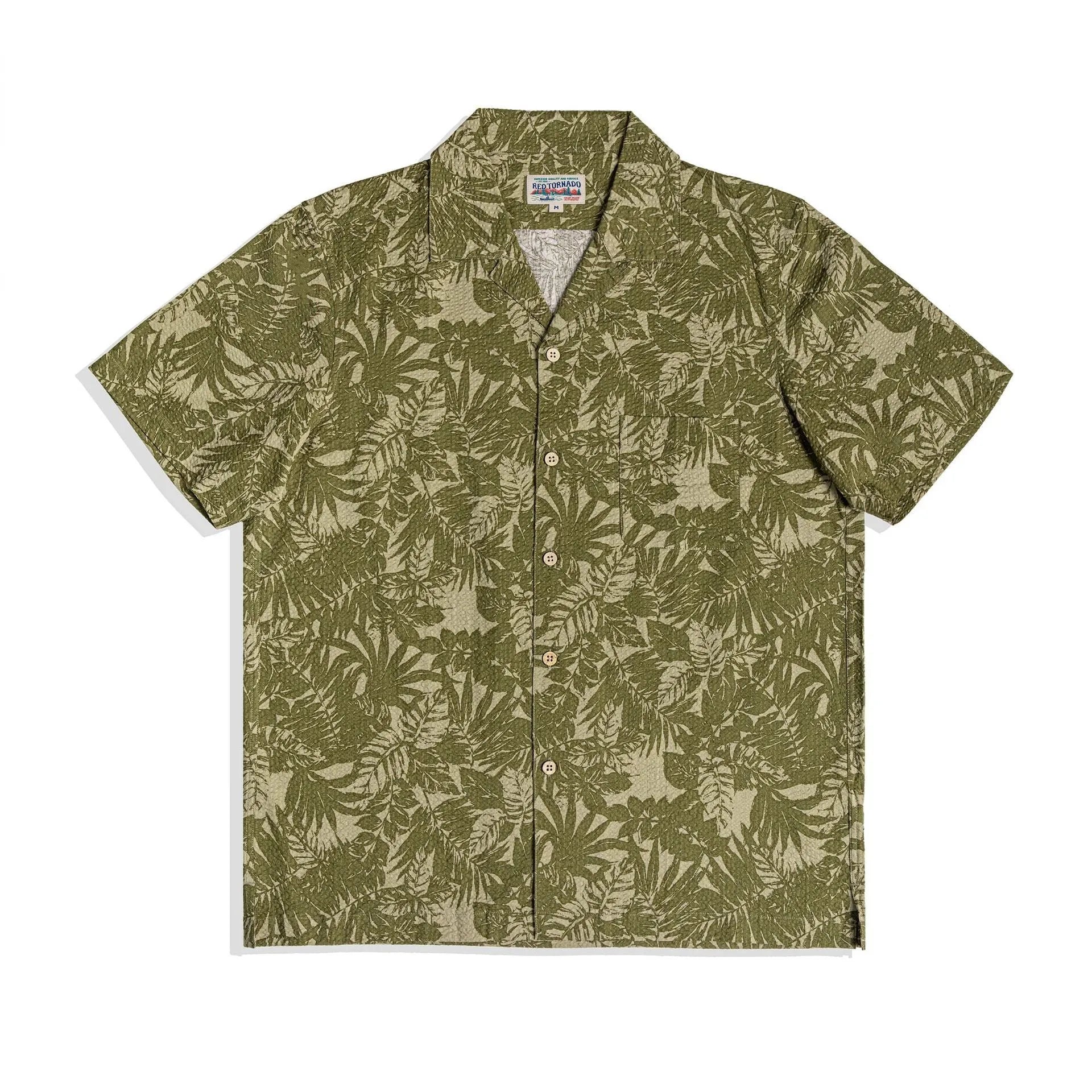 Men's green seersucker shirt with floral print and a Cuban collar, laid flat.