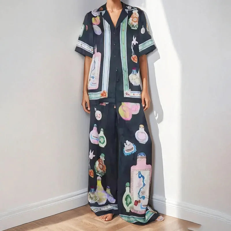 Black women's cardigan and pants set with cartoon animation pattern