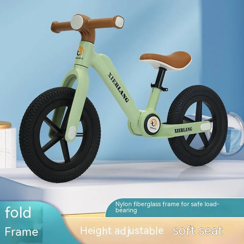 Children's pedal-free foldable balance bike grass green nylon glass fibre frame