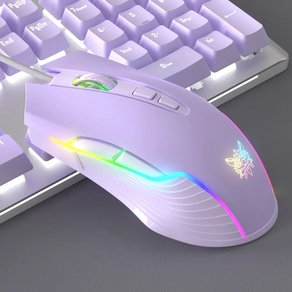 White and purple wired mechanical keyboard and mouse combo set with backlight on a desk.