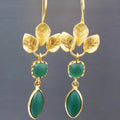 Gold-coloured French leaves tassel drop earrings with zircon crystals and chain detailing
