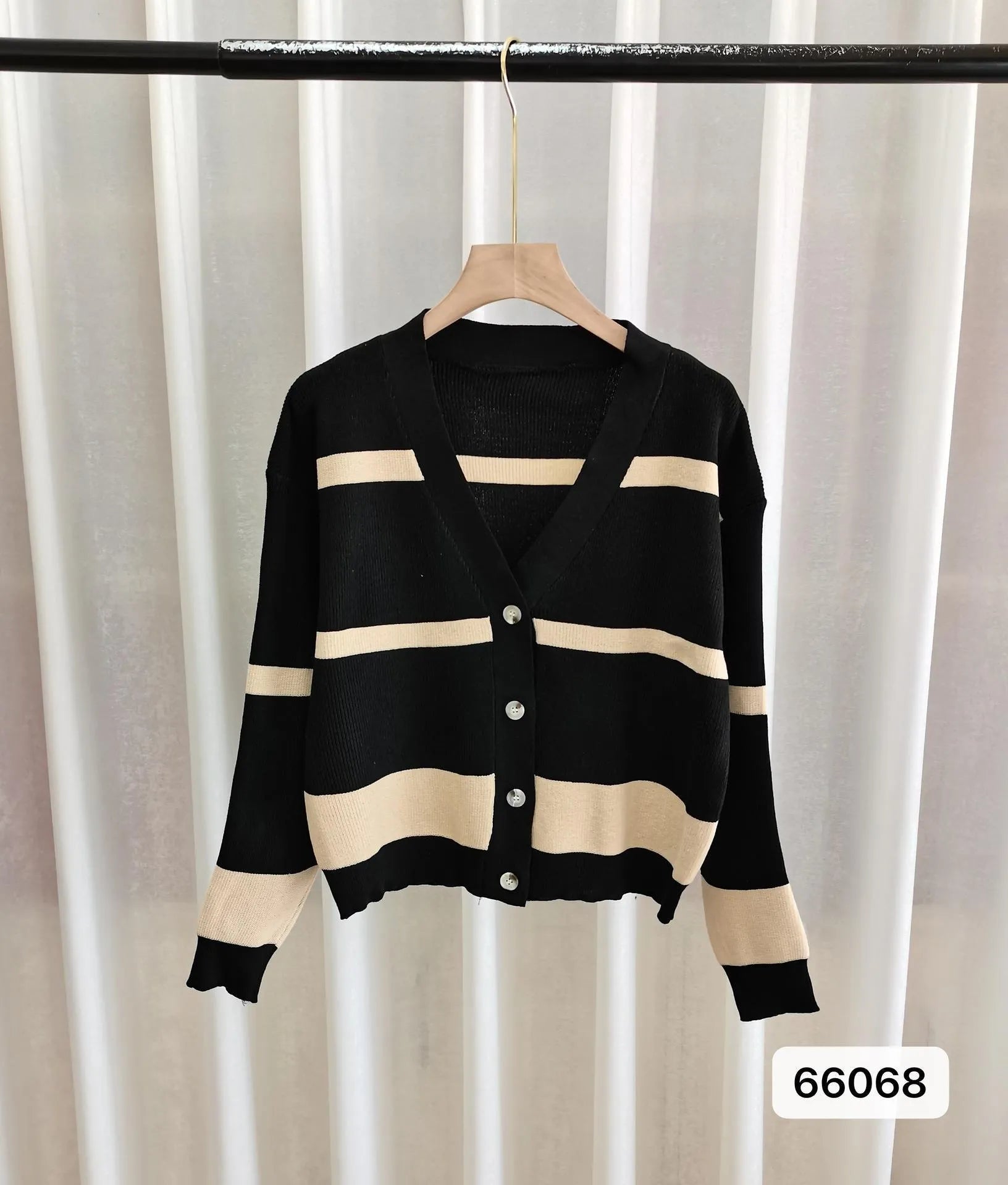 Women's striped V-neck knitted cardigan with 3D pattern in a slim fit, shown in multiple colour options.
