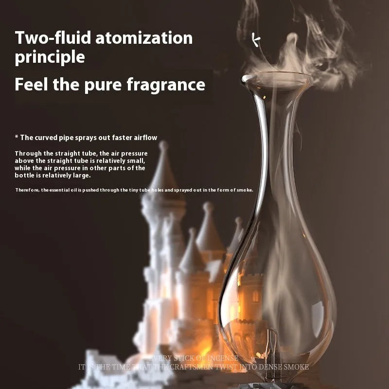 White medieval castle shaped waterless aromatherapy machine with ambient light on a wooden surface.