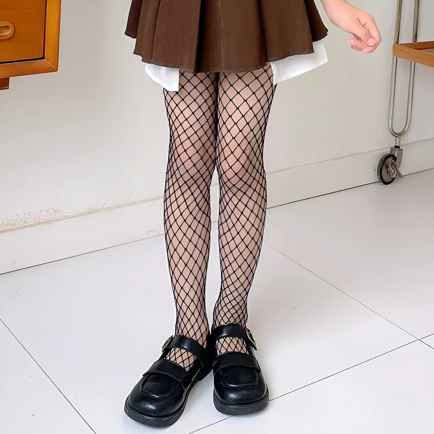Women's summer mesh stockings in black and white, showing large, medium, and small net patterns.