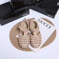 Vintage weave Roman sandals in black with buckle fastening and hollow out design elements