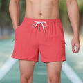 Men's black high-waist polyester training shorts with drawstring waist on a mannequin.