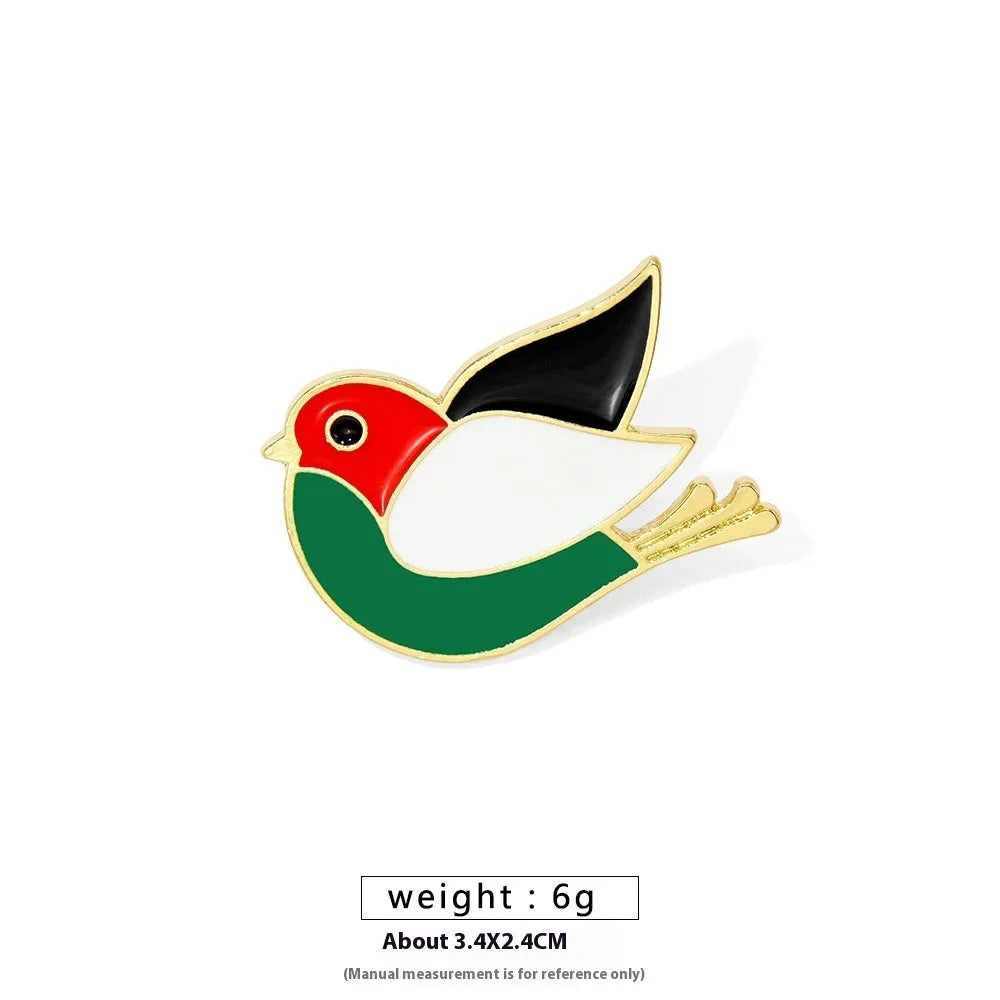Square corrugated alloy brooch with Palestinian flag design on a neutral background