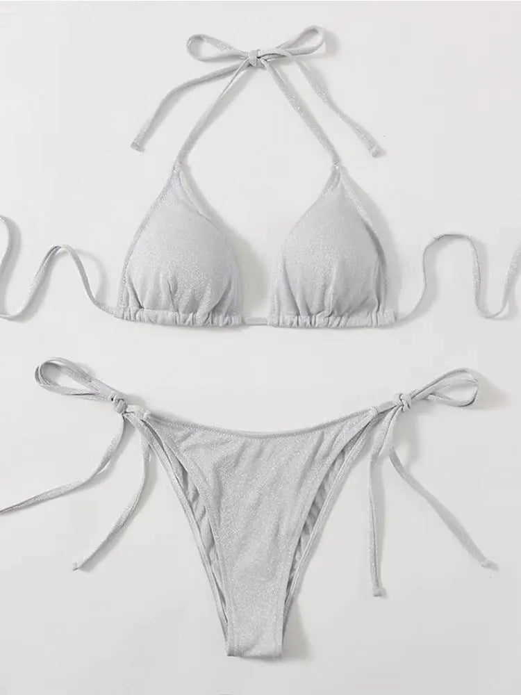 Women's bandage-style bikini swimsuit set in polyester fabric with separate top and pants