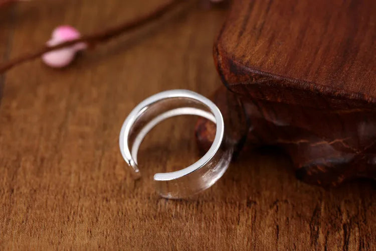 Geometric open sterling silver ring with frosted finish and adjustable opening