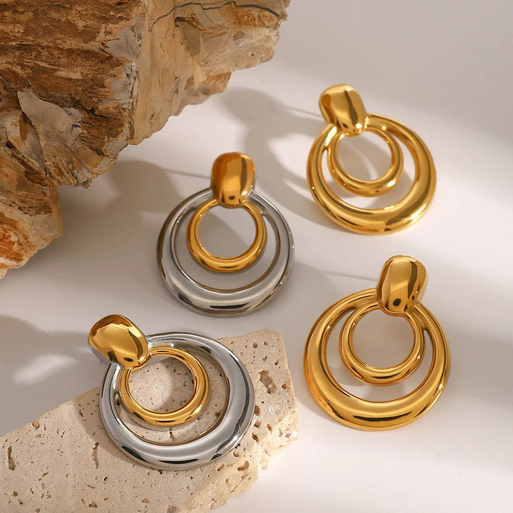 Golden round double-layer hollow stud earrings with geometric design and 18K gold plating