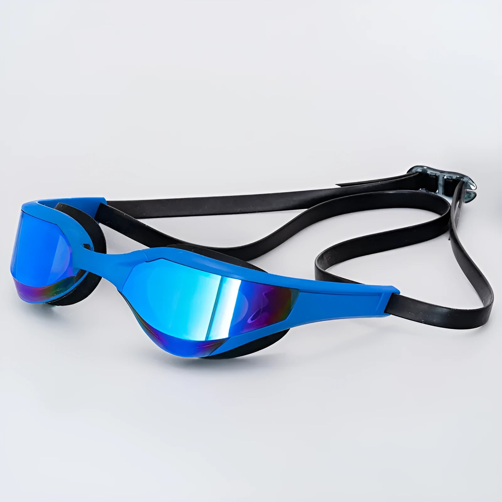 Black and gold plated anti-fog racing swimming goggles with polycarbonate frame on a blue background.