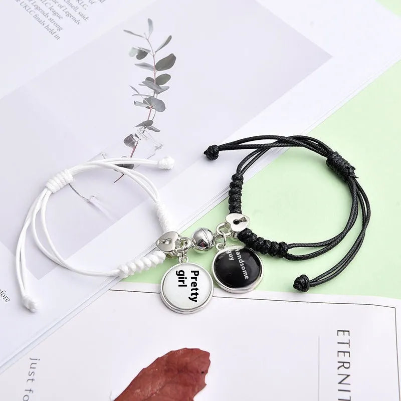 Magnetic couple bracelet pair with alloy electroplating in various designs including clover and crown patterns