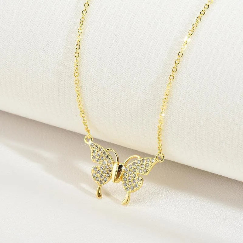 Women's magnetic snap butterfly pendant necklace with twisted titanium steel chain in gold colour