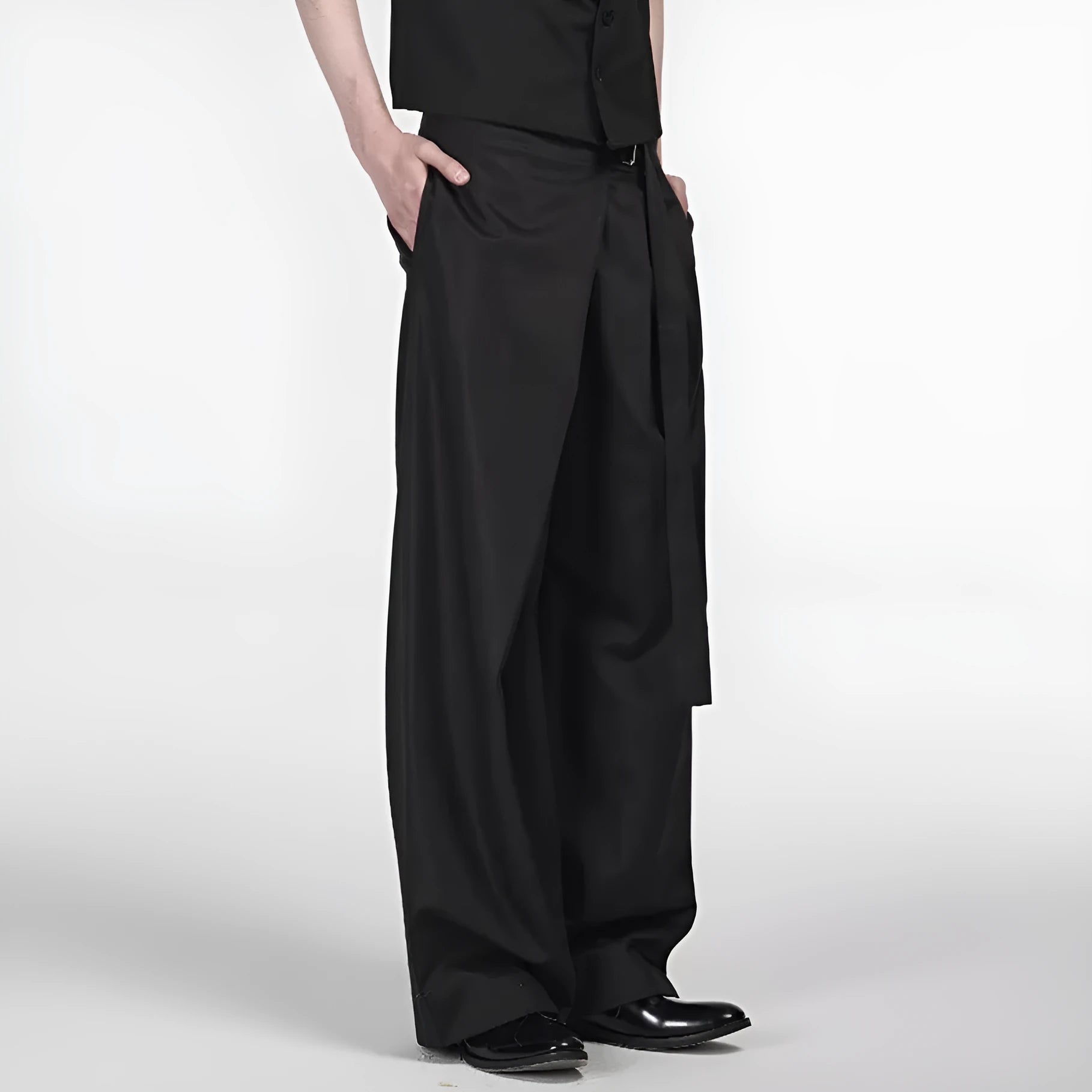 Black straight-leg trousers with a single front pleat and adjustable waistband, laid flat.