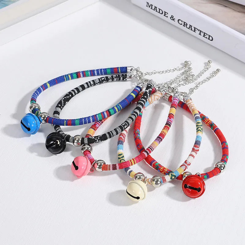 Ethnic patterned adjustable pet collar with a small bell in multiple colour options