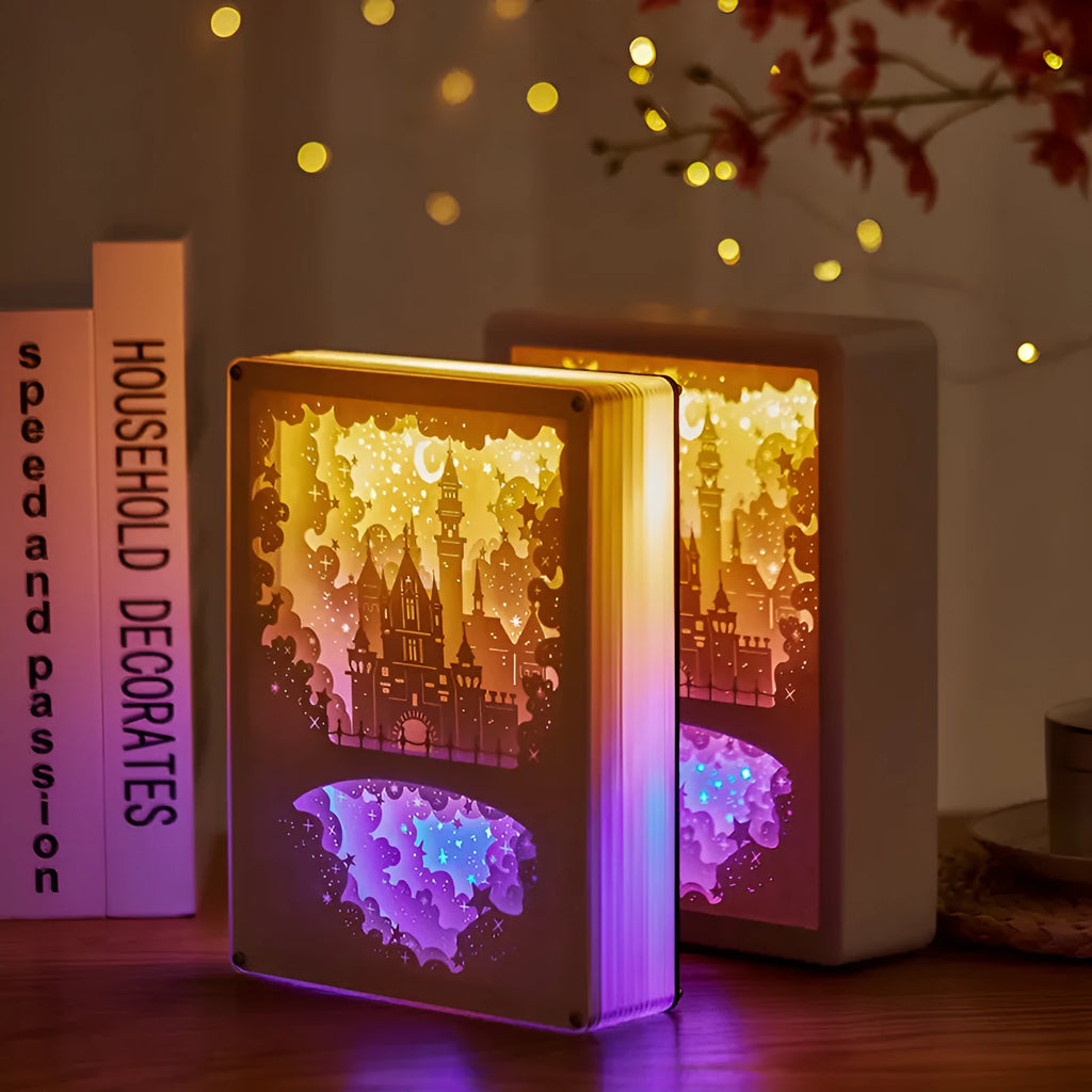 Bedside night light with paper carving design, remote control, and USB power cable
