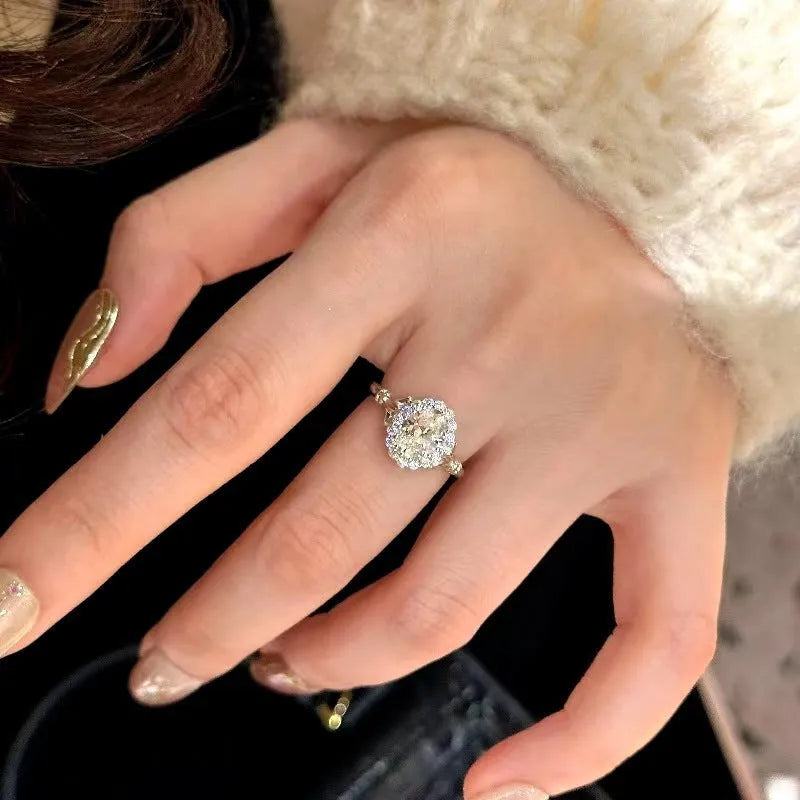 Silver geometric ellipse ring with adjustable opening and diamond treatment