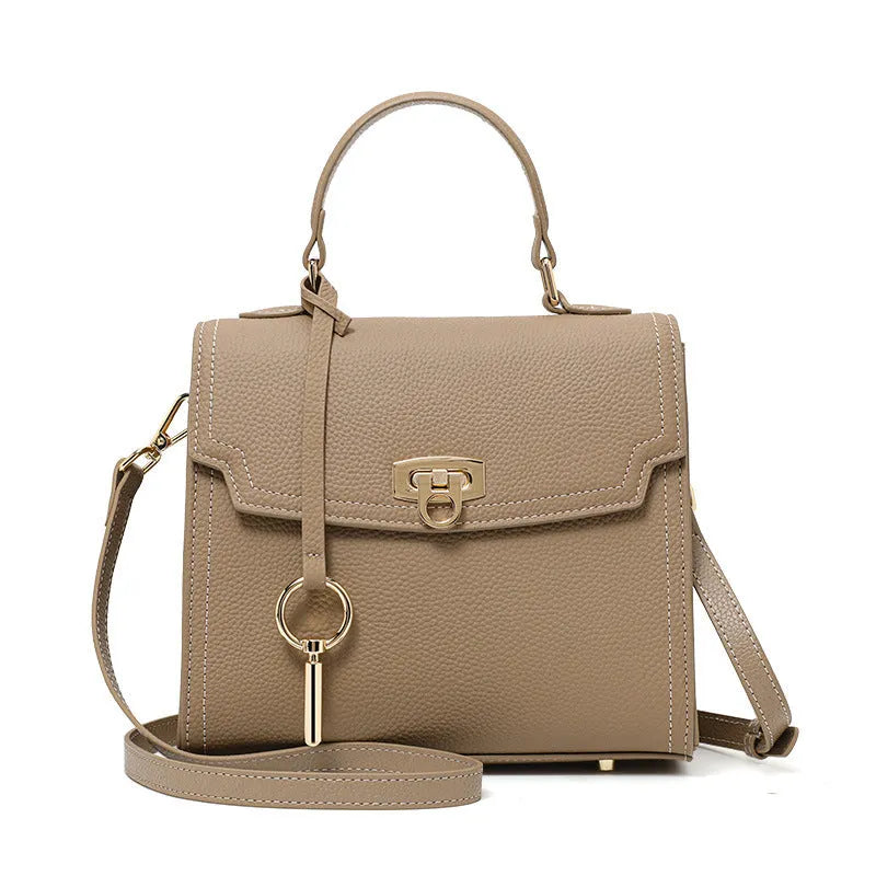 Elephant grey genuine leather vintage handbag with litchi pattern and lock closure