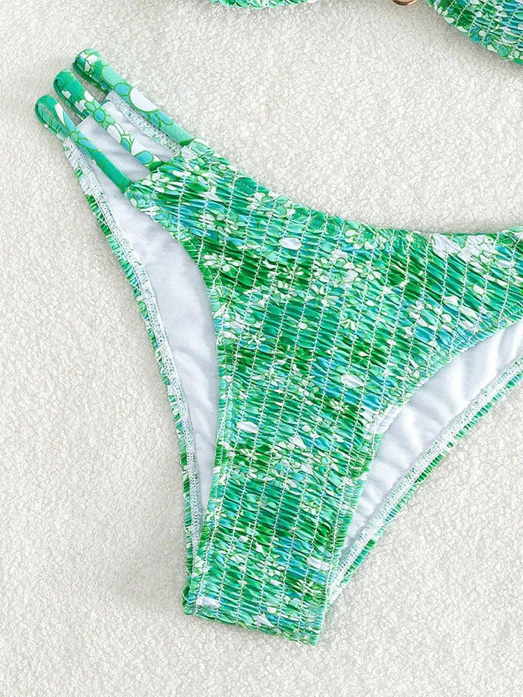 Women's floral print bikini swimsuit with high-waisted briefs in orange, blue, and rose red colours