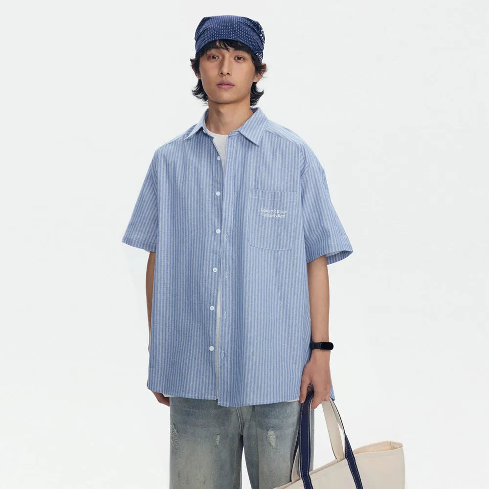 Blue striped overalls shirt with short sleeves and loose cardigan style