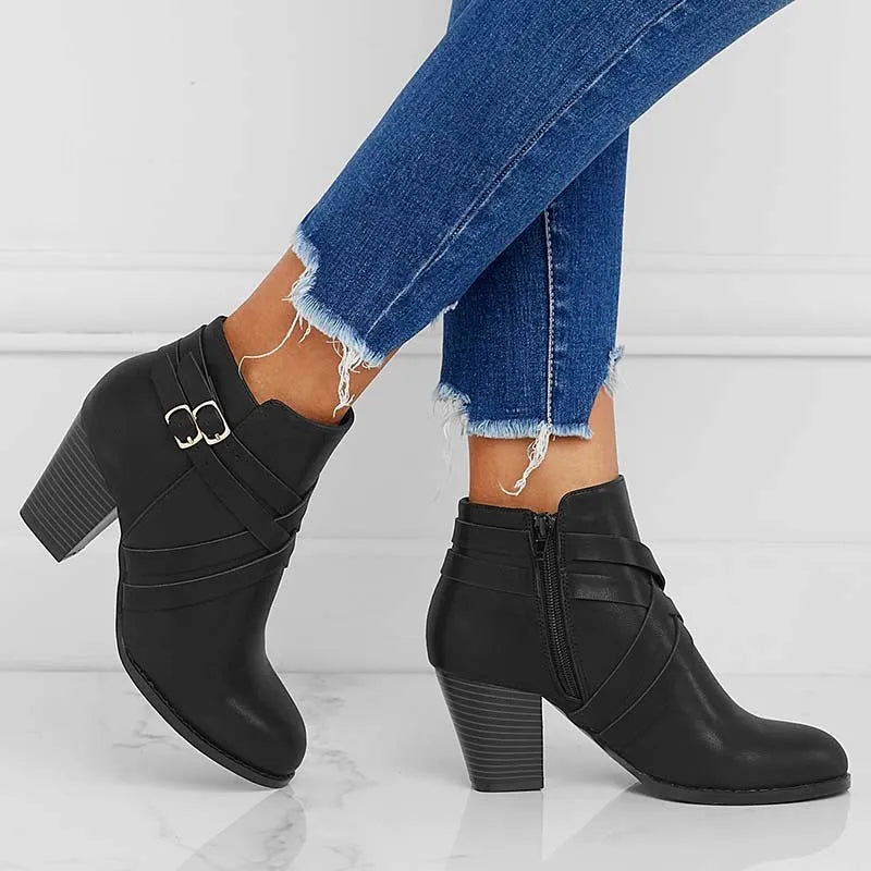 Women's plus size grey ankle boot with a 7cm heel and side zipper.