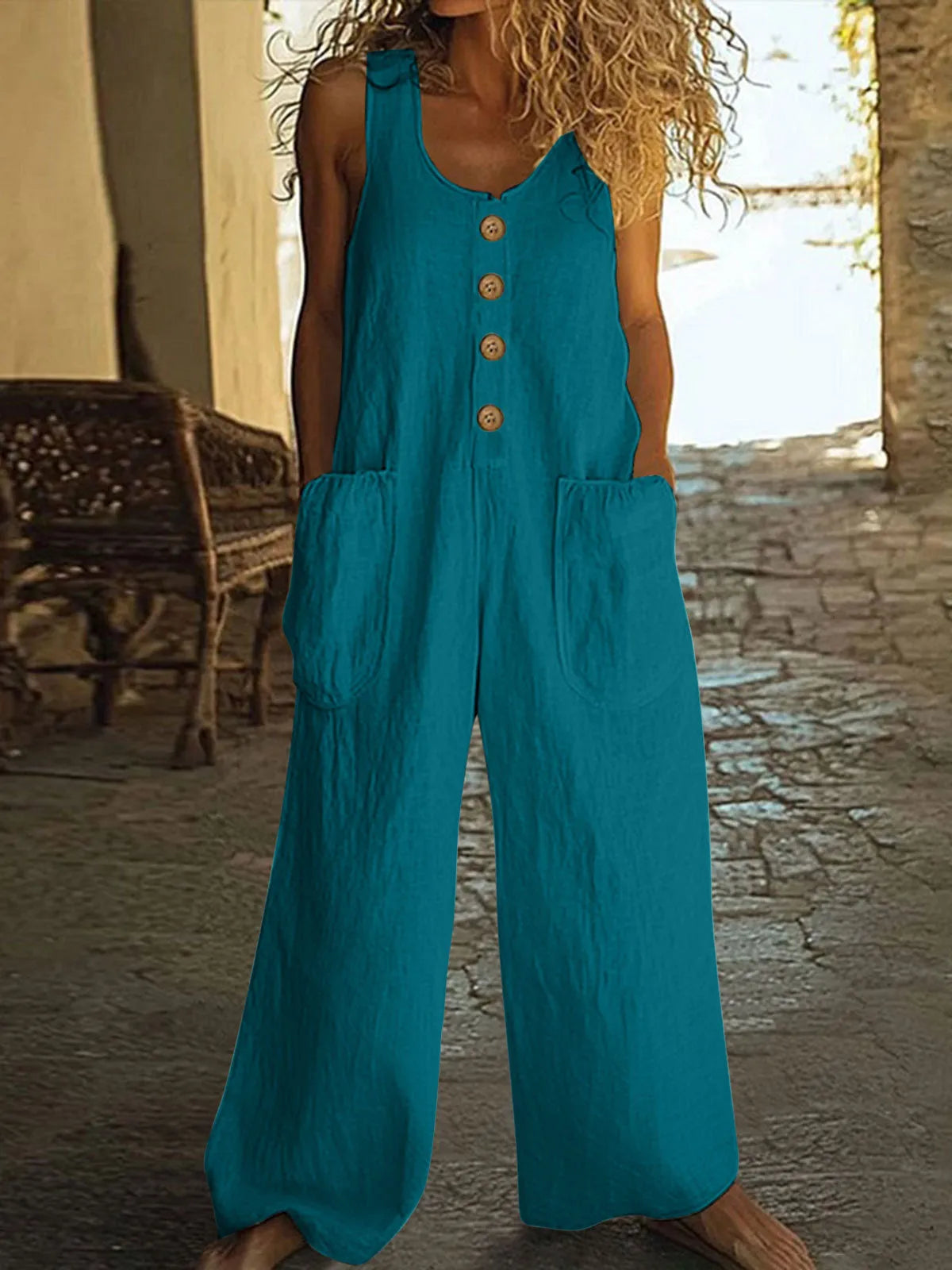 Sleeveless wide leg cotton jumpsuit in army green with pockets and loose fit