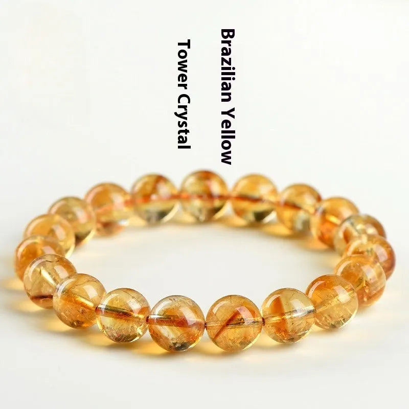 Natural yellow citrine gemstone bracelet showing single circle and three circle bead designs on a wrist.