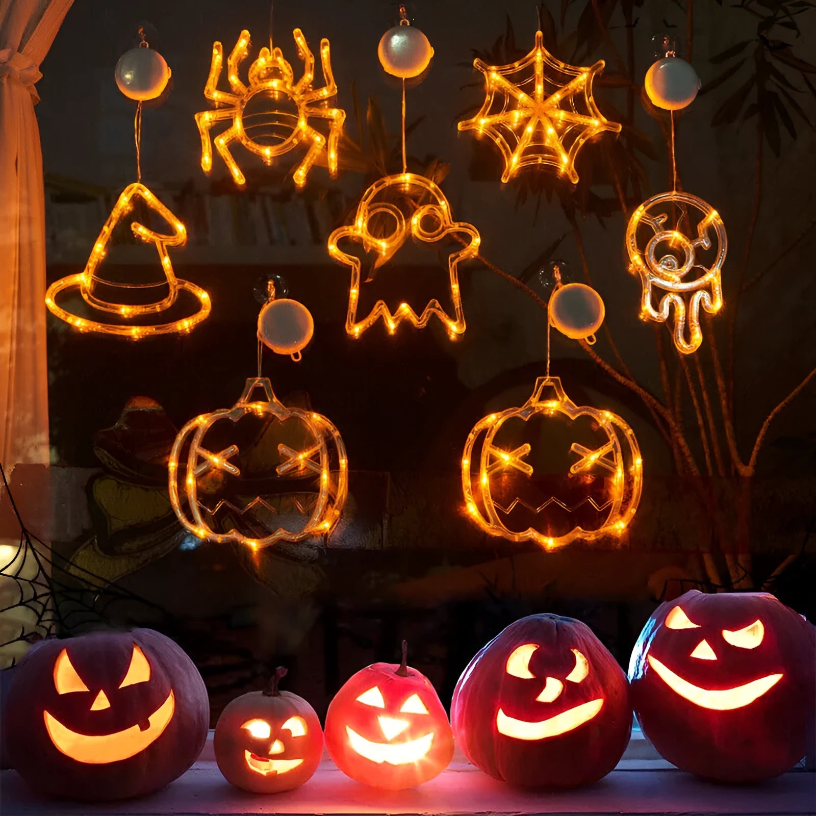 Seven Halloween-themed LED hanging lights with suction cups including spiders, pumpkins and ghosts
