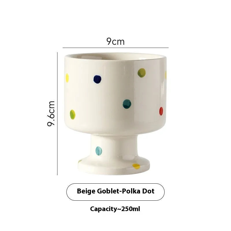 Hand-pinched irregular ceramic mug with modern minimalist design in solid colour