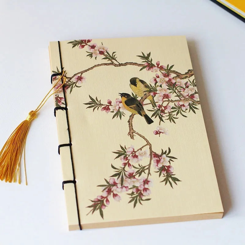 A5 antique wire-bound notebook with retro painting design on white cowhide cover