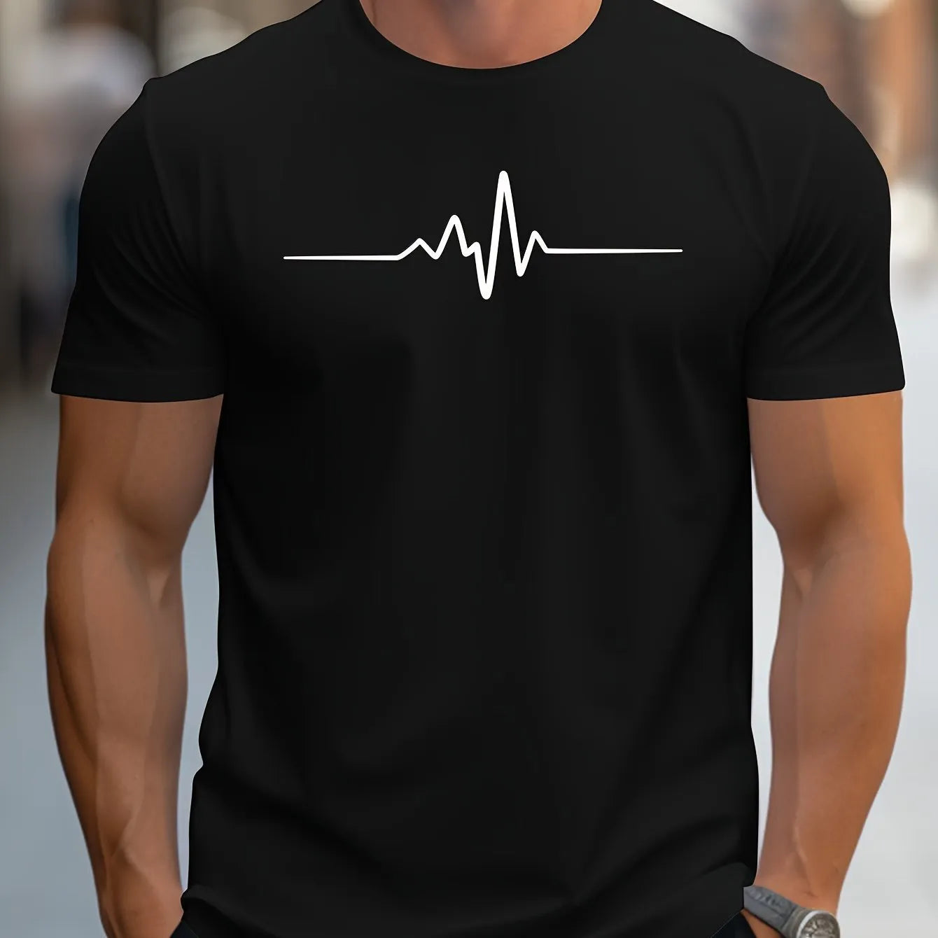 Men's loose-fit short-sleeve t-shirt with a printed letter pattern, shown in a casual style.