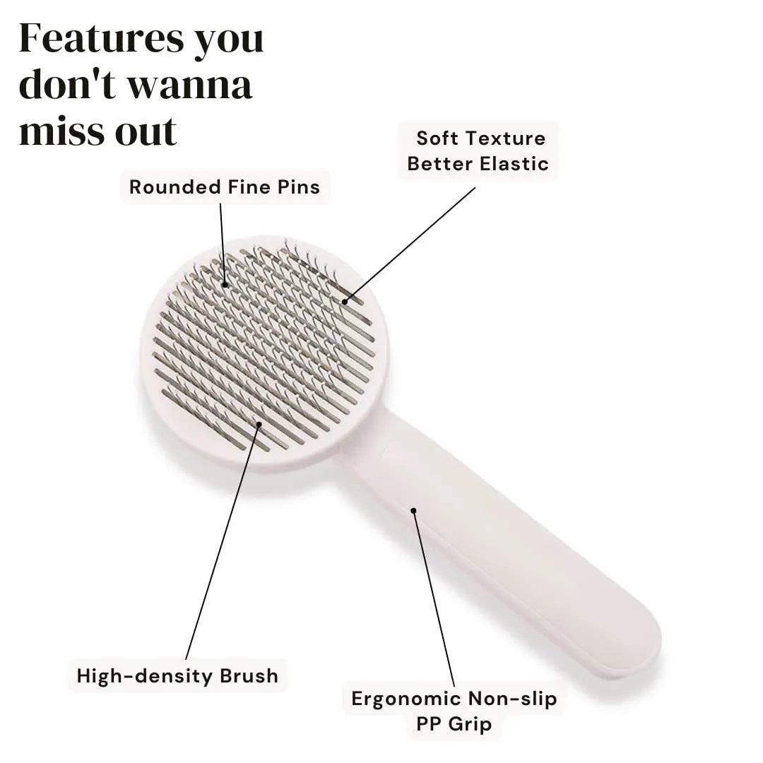 Blue self-cleaning pet slicker brush with ergonomic rubber handle on a grey background.