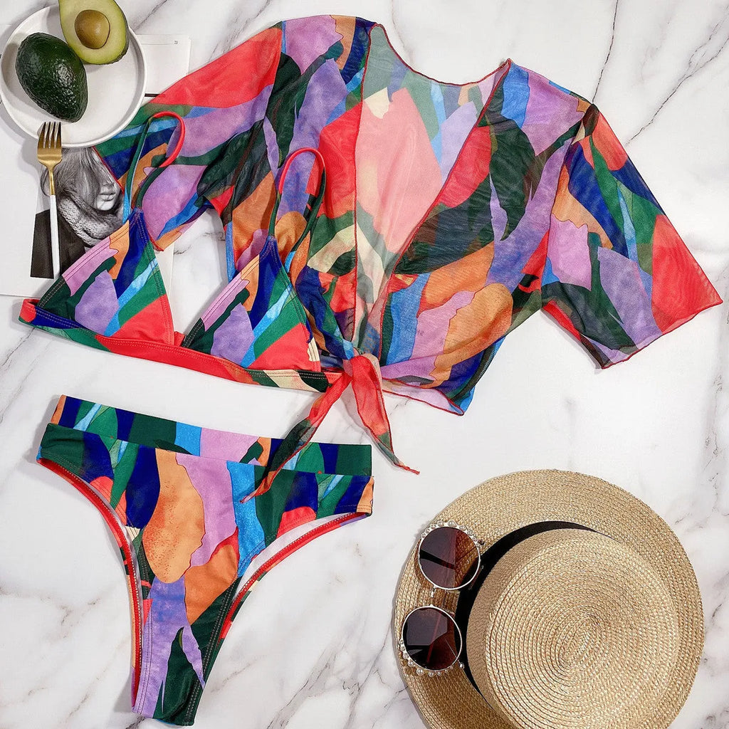 Red women's split swimsuit with printed design for swimming and surfing activities